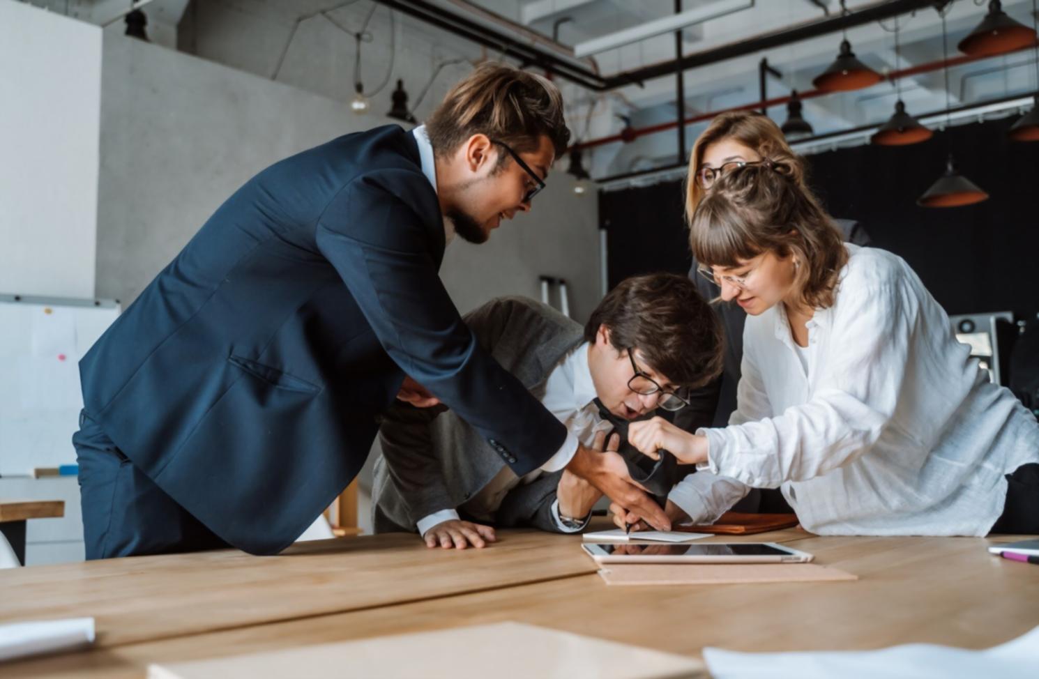 Business owner reviewing cash flow reports and financial planning documents