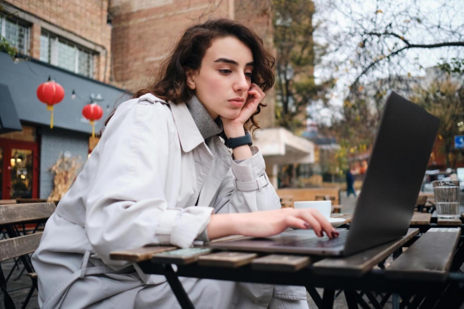 Business owner reviewing financial documents at desk